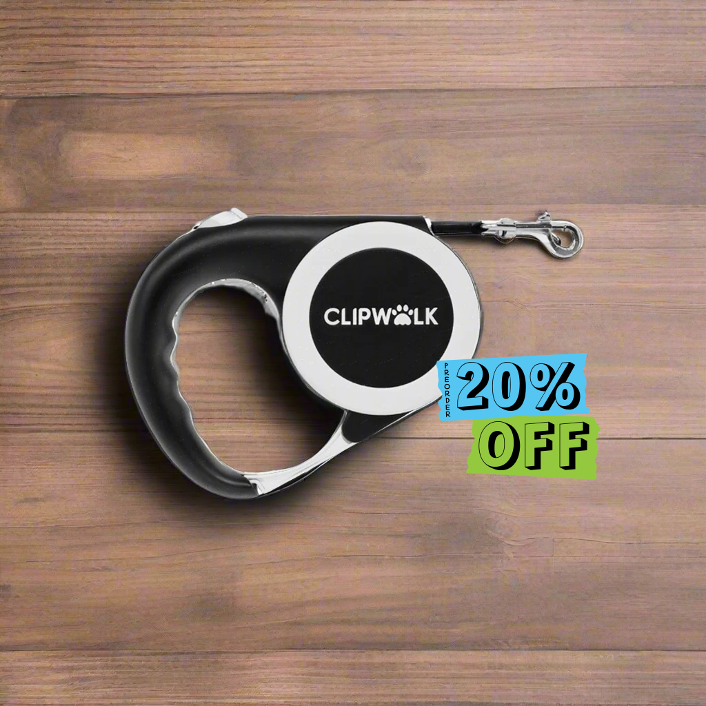 ClipWalk retractable dog leash with  promotional 20% off text on a wooden surface.